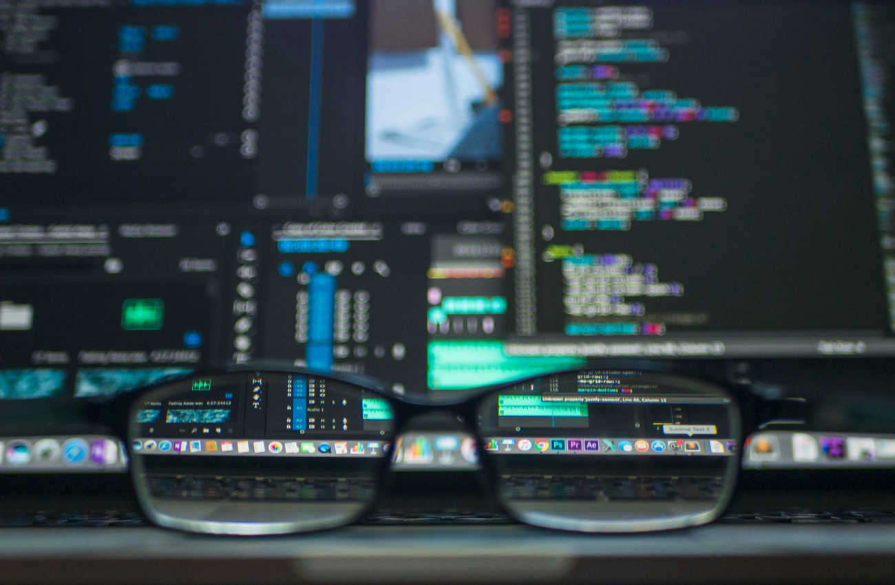 glasses on laptop computer